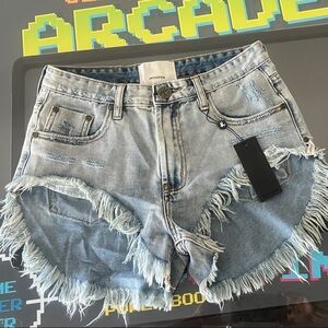 Light Wash Distressed Frayed Denim Shorts - perfect for a music festival